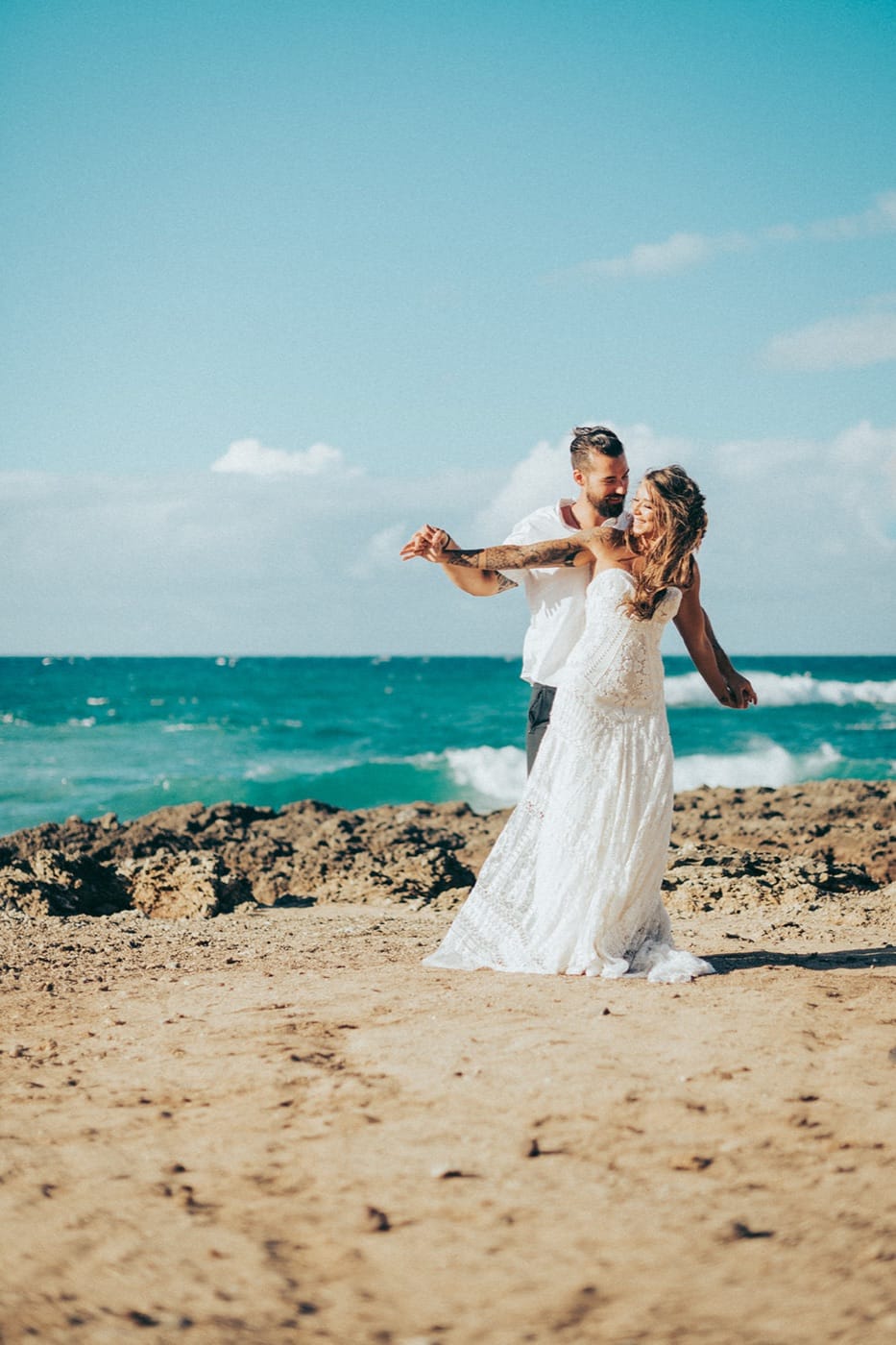 A couple on the North Shore of Oahu on their elopement day
