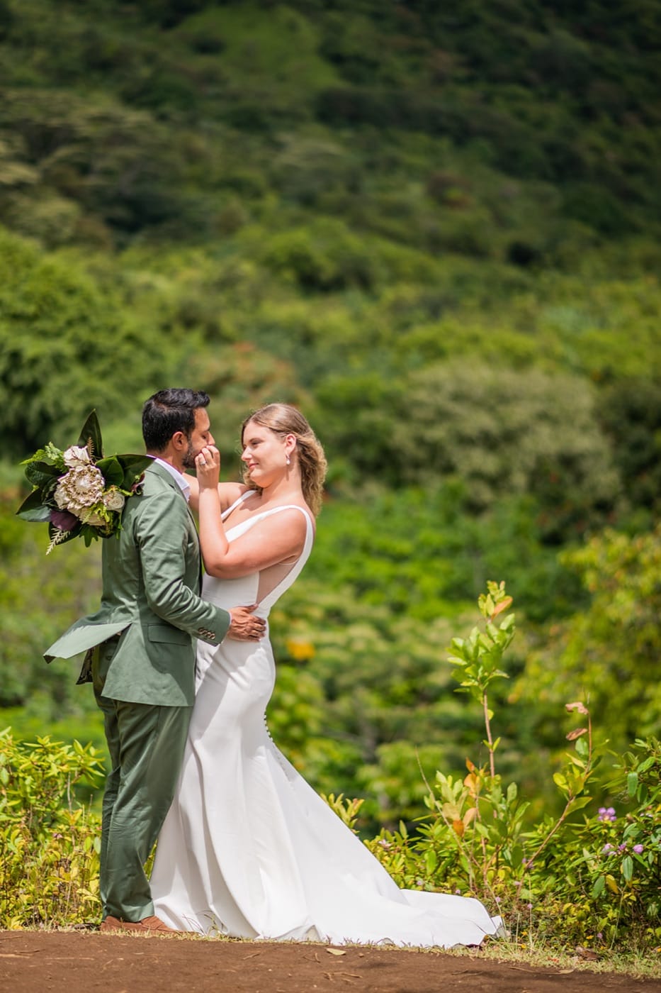 A couple at Ho'omaluhia Botanical Garden, green all around, the light and colorful edit
