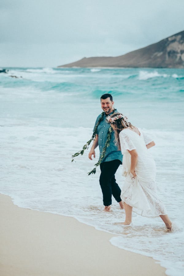 Walking into the surf at Makapu'u Beach after the vows